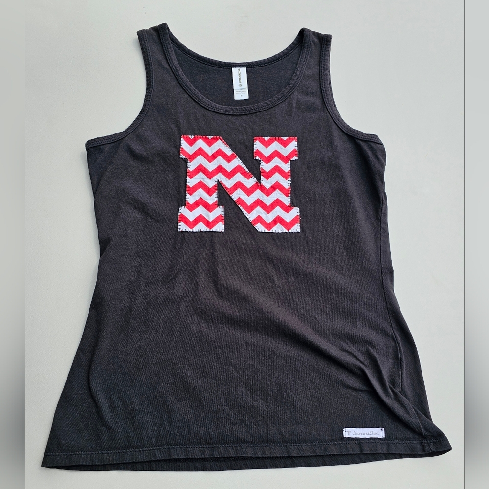 Husker tank size S